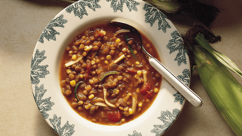 Lentil Vegetable Soup served in a white bowl